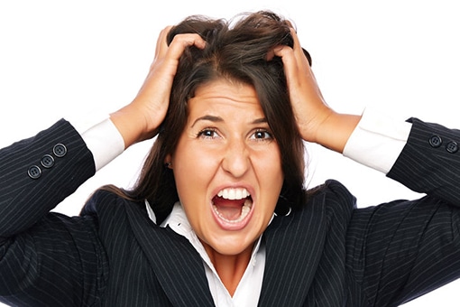 Image of Crazy Lady in Business Suit Pulling Hair Out